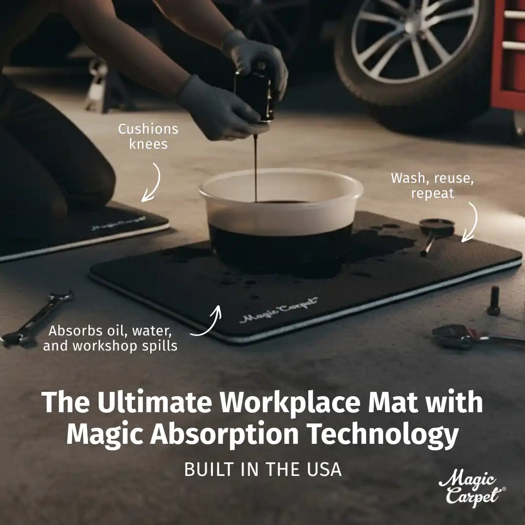 Black Magic Carpet workplace mat absorbing oil during a garage repair, made in the USA